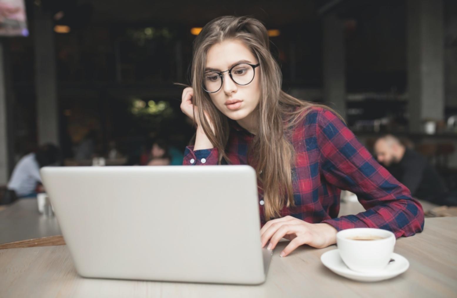 Professional software development team collaborating on bug tracking workflows